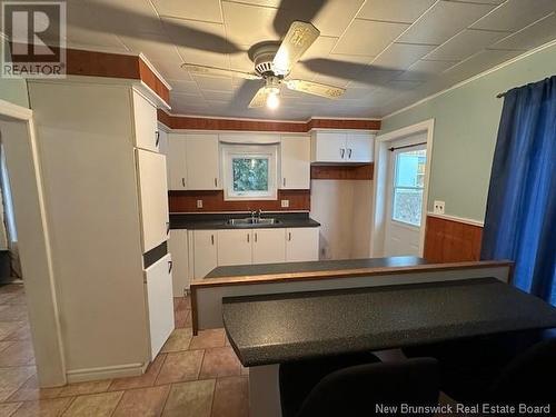 21 Mallet Street, Eel River Crossing, NB - Indoor Photo Showing Kitchen With Double Sink