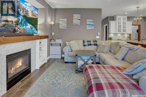 5126 Anthony Way, Regina, SK - Indoor Photo Showing Living Room With Fireplace