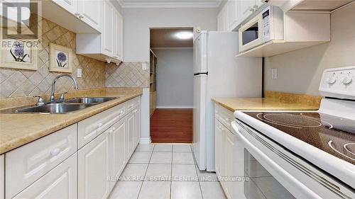 1509 - 966 Inverhouse Drive, Mississauga, ON - Indoor Photo Showing Kitchen With Double Sink