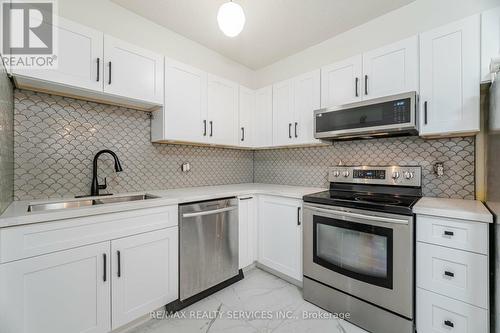 1604 - 20 Mississauga Valley Boulevard, Mississauga, ON - Indoor Photo Showing Kitchen With Stainless Steel Kitchen With Double Sink