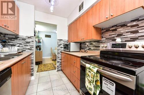 2105 - 390 Dixon Road, Toronto, ON - Indoor Photo Showing Kitchen With Double Sink