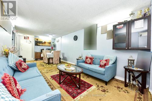 2105 - 390 Dixon Road, Toronto, ON - Indoor Photo Showing Living Room