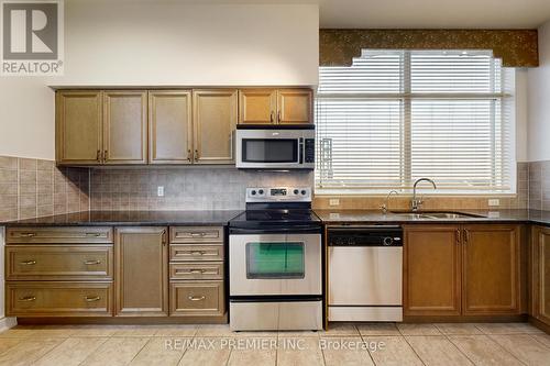 Ph07 - 9225 Jane Street, Vaughan, ON - Indoor Photo Showing Kitchen With Double Sink