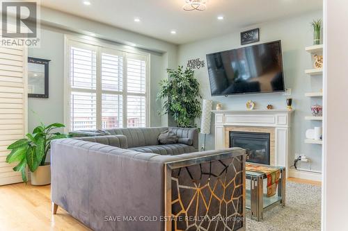 584 Pinery Trail, Waterloo, ON - Indoor Photo Showing Living Room With Fireplace