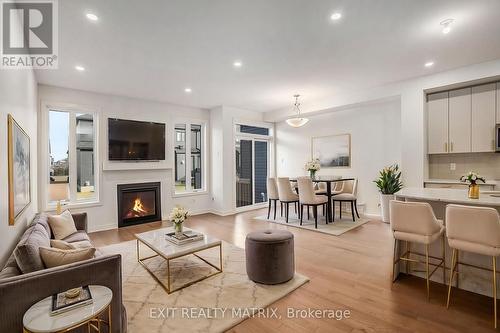 949 Cologne Street, Russell, ON - Indoor Photo Showing Living Room With Fireplace