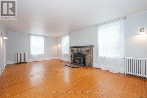 3766 County Road  27, Bradford West Gwillimbury, ON - Indoor Photo Showing Living Room With Fireplace