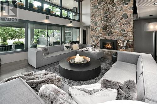 131 Old Mosley Street, Wasaga Beach, ON - Indoor Photo Showing Living Room With Fireplace