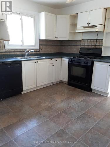 26 Carberry Crescent, Brampton, ON - Indoor Photo Showing Kitchen With Double Sink