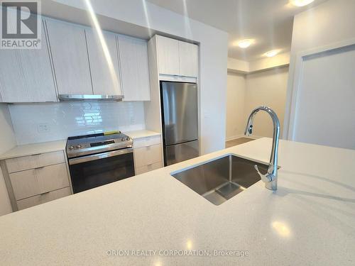 1302 - 4130 Parkside Village Drive, Mississauga, ON - Indoor Photo Showing Kitchen With Stainless Steel Kitchen With Upgraded Kitchen