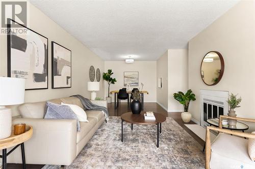 B 62 Nollet Avenue, Regina, SK - Indoor Photo Showing Living Room With Fireplace