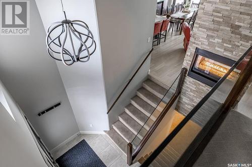 526 Gillies Cove, Saskatoon, SK - Indoor Photo Showing Other Room With Fireplace