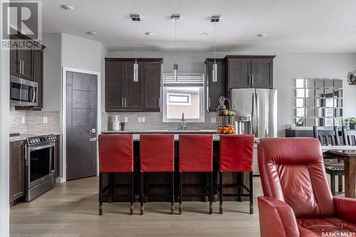 526 Gillies Cove, Saskatoon, SK - Indoor Photo Showing Kitchen With Double Sink