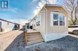 View of home's exterior featuring ac unit - 