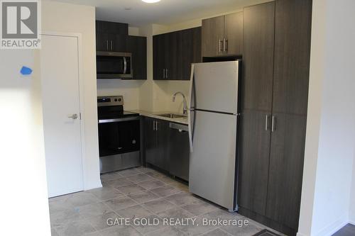 35 Priya Lane N, Toronto, ON - Indoor Photo Showing Kitchen