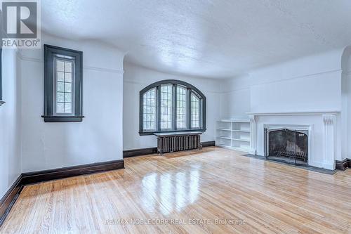 A  Main - 809 Duplex Avenue, Toronto, ON - Indoor Photo Showing Living Room With Fireplace