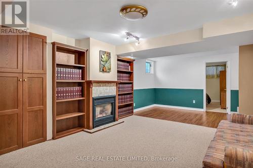 17 Patricia Place, Kawartha Lakes, ON - Indoor Photo Showing Other Room With Fireplace