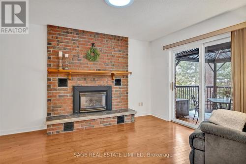 17 Patricia Place, Kawartha Lakes, ON - Indoor Photo Showing Living Room With Fireplace