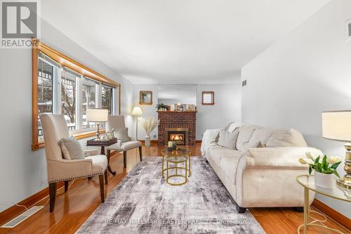 217 Mcfarlane Street, Peterborough (Ashburnham), ON - Indoor Photo Showing Living Room With Fireplace