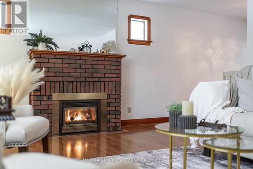 217 Mcfarlane Street, Peterborough (Ashburnham), ON - Indoor Photo Showing Living Room With Fireplace