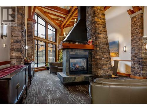 400 Stemwinder Drive Unit# 107, Kimberley, BC - Indoor Photo Showing Living Room With Fireplace