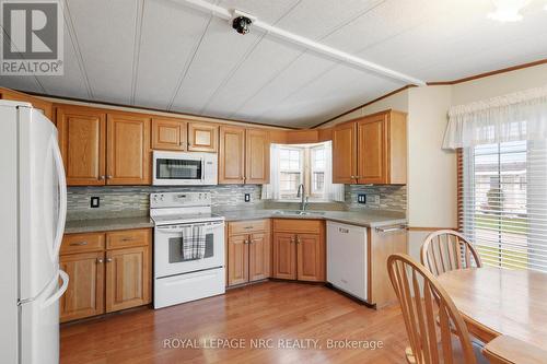 #248 - 3033 Townline Road, Fort Erie (327 - Black Creek), ON - Indoor Photo Showing Kitchen With Double Sink