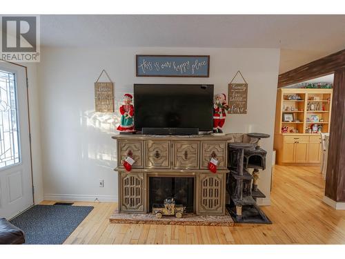 12286 242 Road, Fort St. John, BC - Indoor Photo Showing Living Room With Fireplace