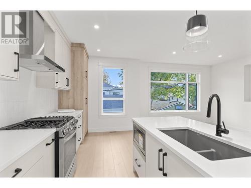 751 Fuller Avenue Unit# 1, Kelowna, BC - Indoor Photo Showing Kitchen With Double Sink