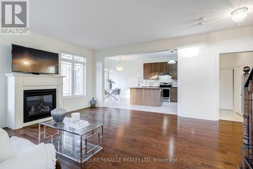 41 Atkinson Crescent, New Tecumseth, ON - Indoor Photo Showing Living Room With Fireplace