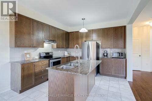 41 Atkinson Crescent, New Tecumseth, ON - Indoor Photo Showing Kitchen With Double Sink