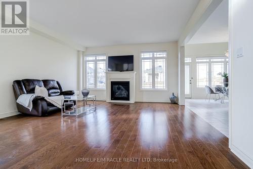 41 Atkinson Crescent, New Tecumseth, ON - Indoor Photo Showing Living Room With Fireplace