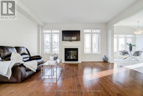 41 Atkinson Crescent, New Tecumseth, ON - Indoor Photo Showing Living Room With Fireplace