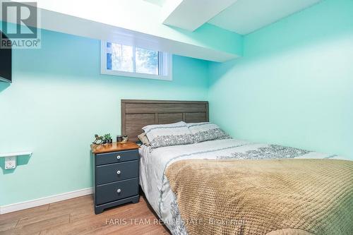 328 Peek-A-Boo Trail, Tiny, ON - Indoor Photo Showing Bedroom