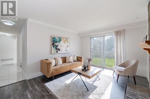 17 Macdougall Drive, Brampton, ON - Indoor Photo Showing Living Room With Fireplace