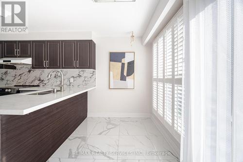 17 Macdougall Drive, Brampton, ON - Indoor Photo Showing Kitchen With Double Sink