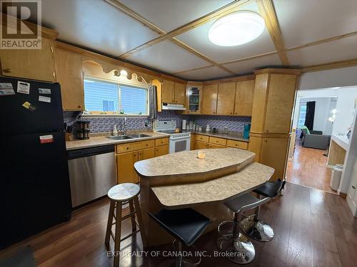 384 Commercial Avenue, Timmins, ON - Indoor Photo Showing Kitchen With Double Sink