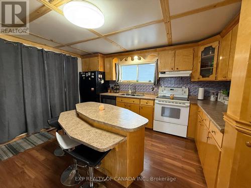 384 Commercial Avenue, Timmins, ON - Indoor Photo Showing Kitchen With Double Sink