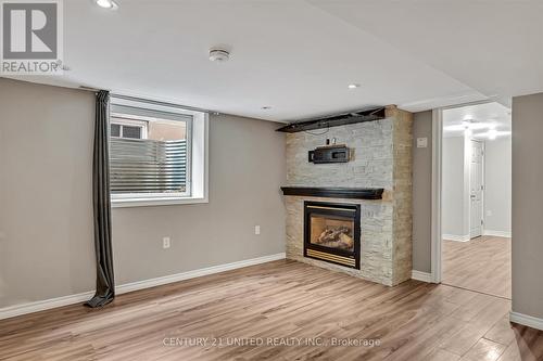 891 Ford Street, Peterborough (Monaghan), ON - Indoor Photo Showing Living Room With Fireplace