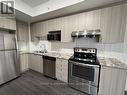 B720 - 99 South Town Centre, Markham, ON  - Indoor Photo Showing Kitchen With Double Sink With Upgraded Kitchen 