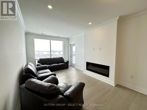 504 - 480 Callaway Road, London, ON - Indoor Photo Showing Living Room With Fireplace