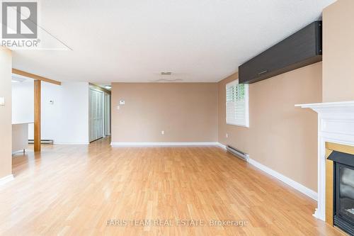 9 Coles Street, Barrie, ON - Indoor Photo Showing Other Room With Fireplace