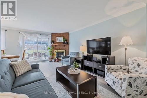 40 Crenshaw Court, Brampton, ON - Indoor Photo Showing Living Room With Fireplace