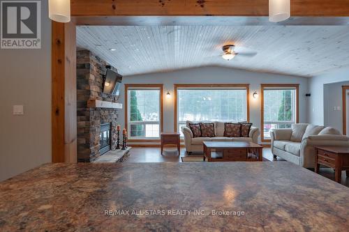 120 Echo Bay Road, Kawartha Lakes (Bobcaygeon), ON - Indoor Photo Showing Living Room With Fireplace