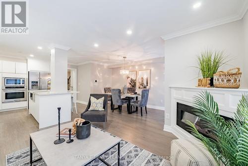 3 Delight Way, Whitby, ON - Indoor Photo Showing Other Room With Fireplace