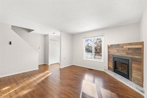 141 Balaban Place, Winnipeg, MB - Indoor Photo Showing Other Room With Fireplace