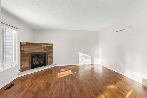 141 Balaban Place, Winnipeg, MB - Indoor Photo Showing Other Room With Fireplace