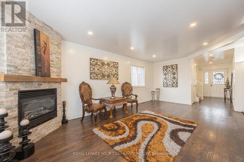 33 Veseli Court, Bradford West Gwillimbury, ON - Indoor Photo Showing Living Room With Fireplace