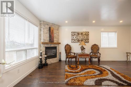 33 Veseli Court, Bradford West Gwillimbury, ON - Indoor Photo Showing Living Room With Fireplace