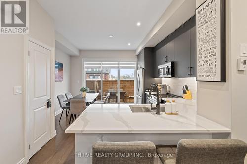 Kitchen With Quartz Counter Tops - 36 - 26 Lunar Crescent, Mississauga (Streetsville), ON - Indoor