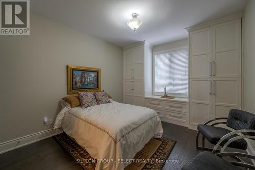 4TH BEDROOM WITH CUSTOM BUILT-IN CABINETRY - 17 - 145 Base Line Road E, London, ON - Indoor Photo Showing Bedroom