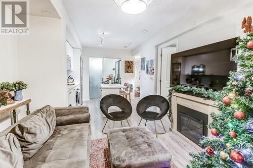 408 - 2301 Danforth Avenue, Toronto, ON - Indoor Photo Showing Living Room With Fireplace